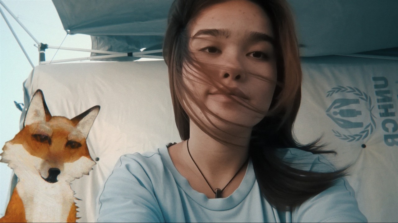 Close up of Soraya with a cartoon fox